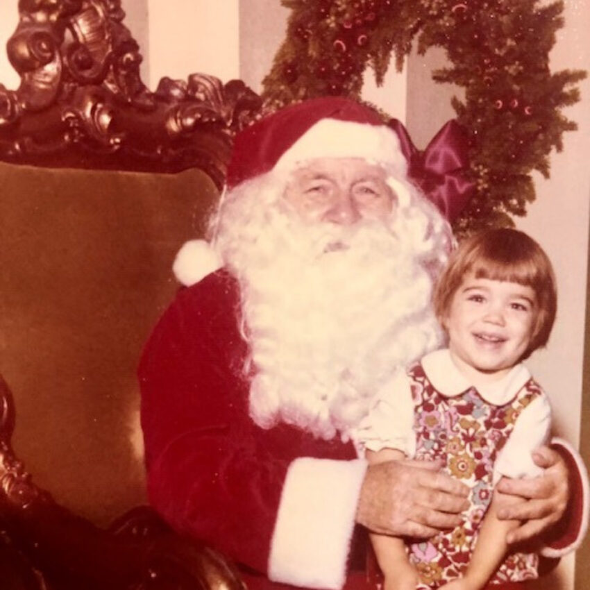 Kim Caldwell holiday photo with Santa when she was younger