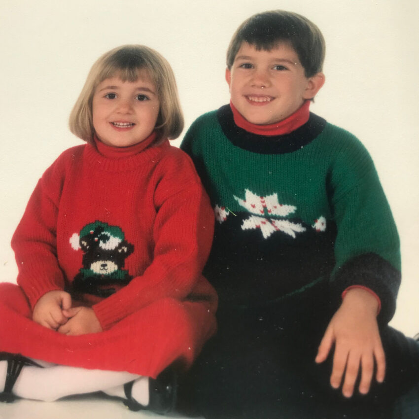 Maggie Parker and her brother posing for a holiday photo when they were babies.